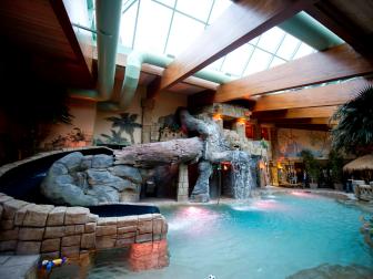CORTLAND, OH-January 12: The Ross' indoor swimming pool features waterfalls, Mayen ruin replicas, a waterslide, a hot tub, and a glass ceiling.  Brian and Kim Ross built their 75,000 sq ft home(including garages) a decade ago along a stream on 130 acres of property north of Youngstown.  The home has been an inviting refuge for the Rosses and their 3 children, and their friends. 