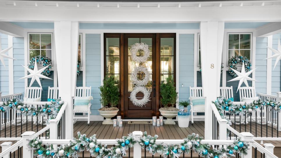 Front Porch Decorated With Stars, Wreaths and Garland for the Holidays